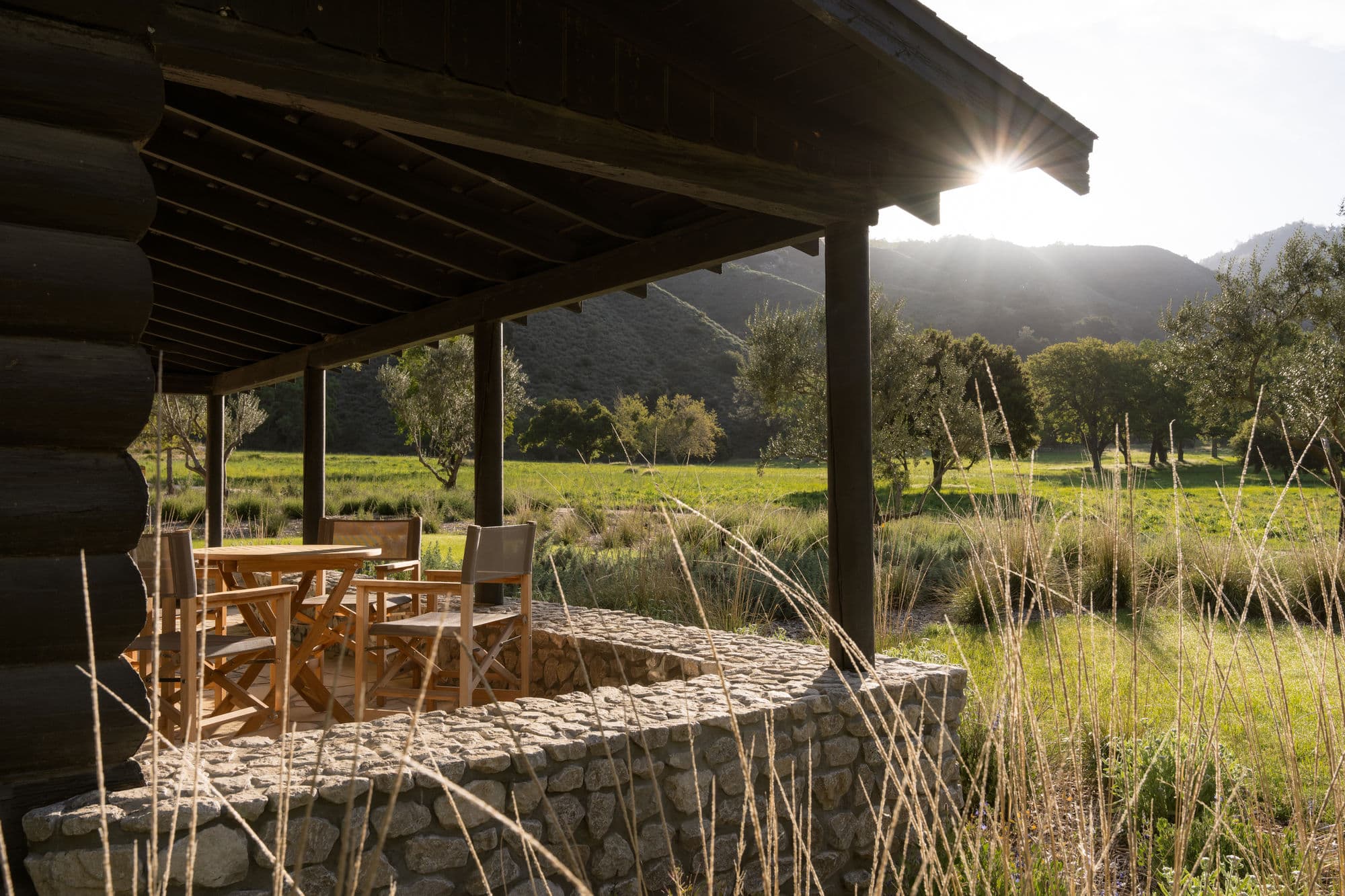 A cabin porch at golden hour, Zaca Lake